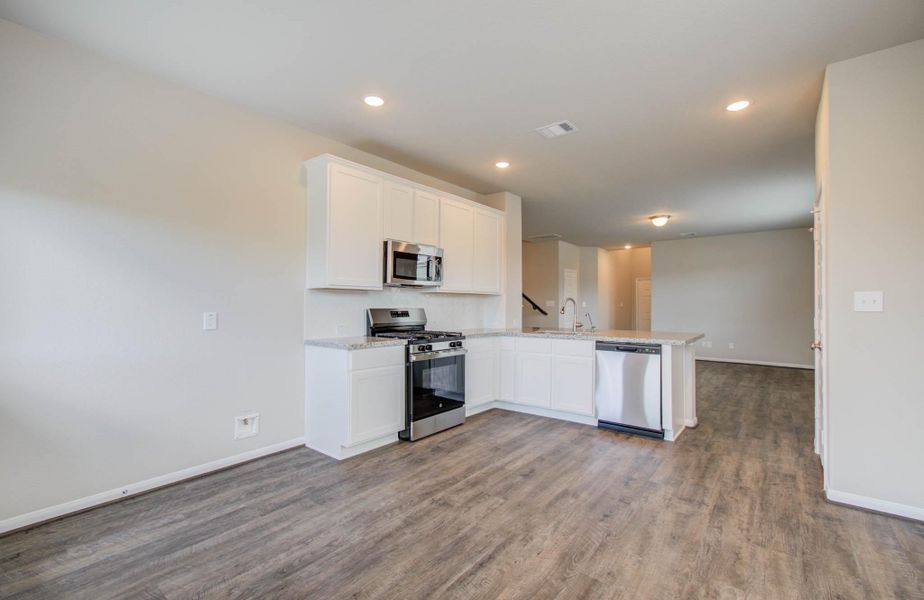 Furnished interior view inside a new home in Legends Bay, Baytown (Image 14).
