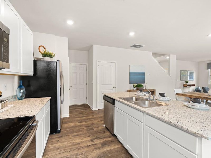 Furnished interior view inside a new home in Oaks at Cedar Grove, Fairburn (Image 8).