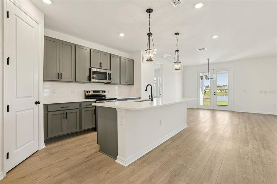 Furnished interior view inside a new home in Ellington Traditional, St. Cloud (Image 7). Furnished interior view inside a new home in Ellington Traditional, St. Cloud (Image 7).
