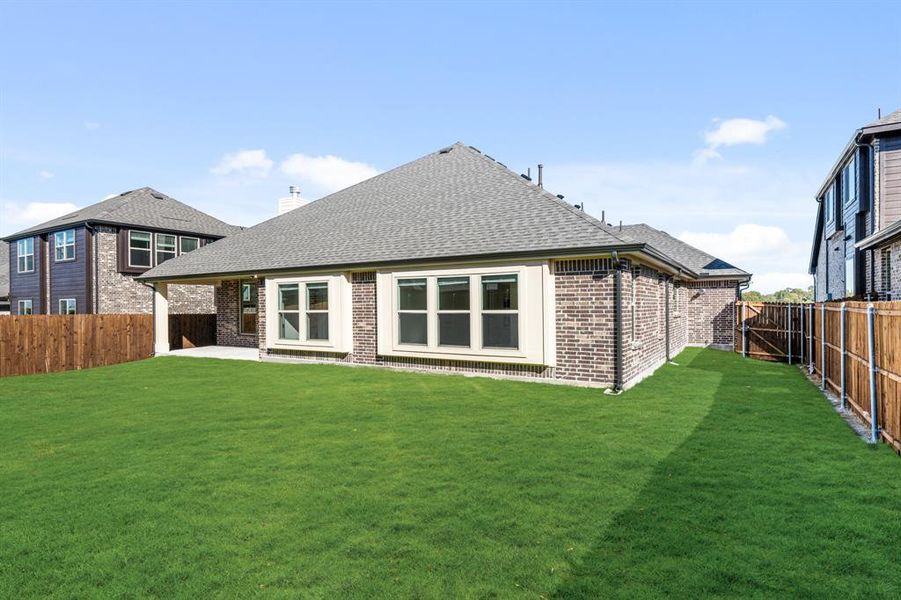 Exterior details and patio area of a home in Meadow Vista 60-65, Anna (Image 23). Exterior details and patio area of a home in Meadow Vista 60-65, Anna (Image 23).