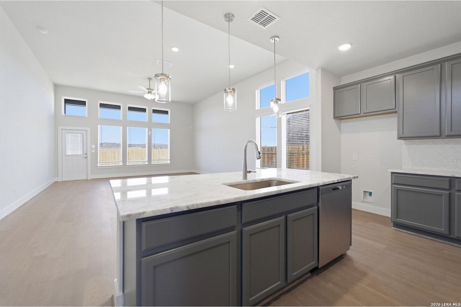Furnished interior view inside a new home in The Woodlands at Medina Hills, Mico (Image 12).
