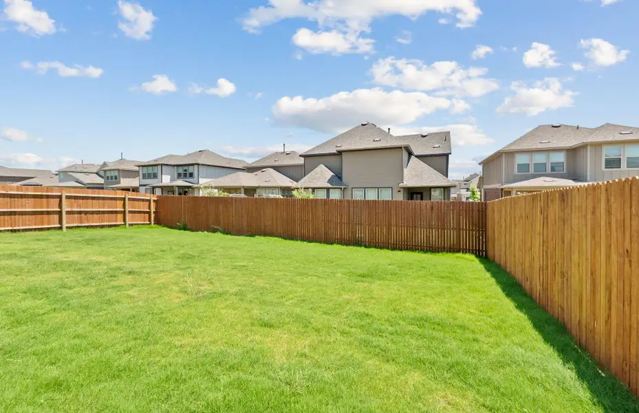 Exterior details and patio area of a home in Saddleback at Santa Rita Ranch, Liberty Hill (Image 3). Exterior details and patio area of a home in Saddleback at Santa Rita Ranch, Liberty Hill (Image 3).