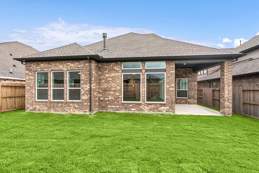 Front exterior of a new home in Riceland 50’ Front Load Homesites, Mont Belvieu, TX, highlighting curb appeal (Image 21). Front exterior of a new home in Riceland 50’ Front Load Homesites, Mont Belvieu, TX, highlighting curb appeal (Image 21).