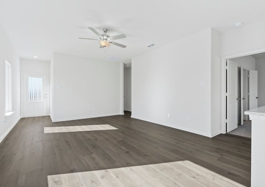 The family room is spacious and has plenty of room for furniture.