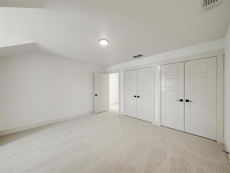 Bedroom #3 with dual French door closet Bedroom #3 with dual French door closet
