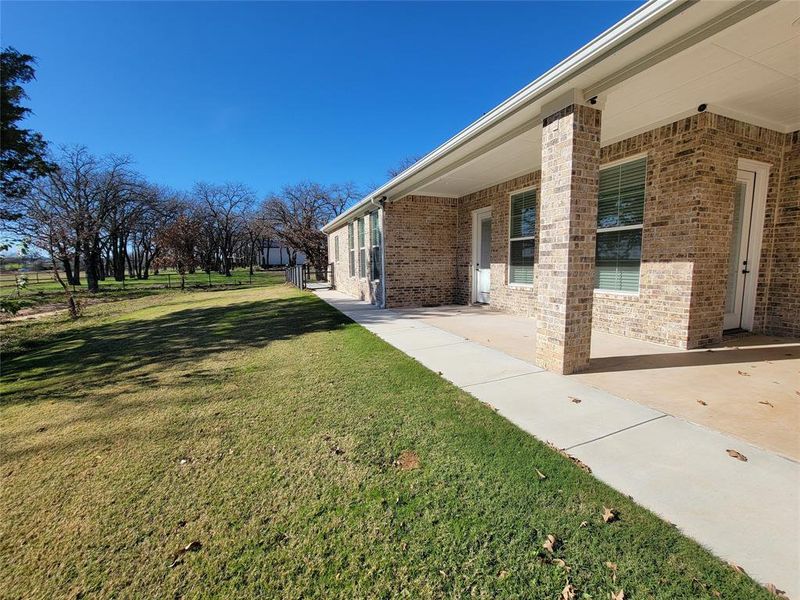 View of yard and back patio