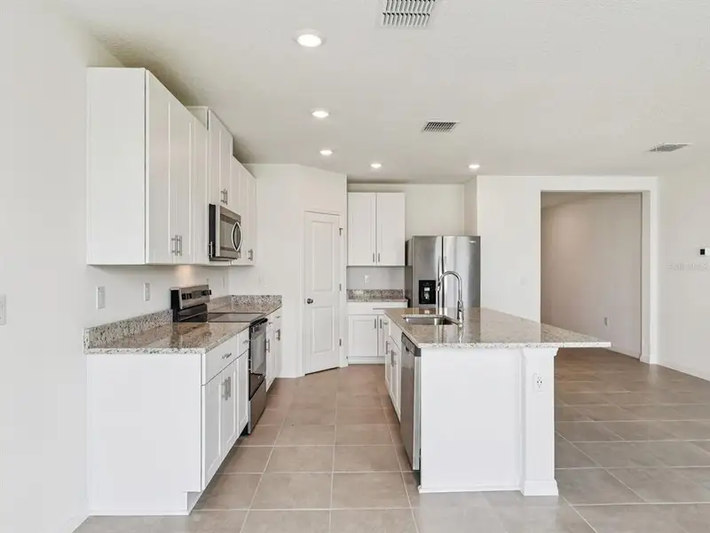 Furnished interior view inside a new home in The Reserve at Van Oaks, Auburndale (Image 7). Furnished interior view inside a new home in The Reserve at Van Oaks, Auburndale (Image 7).