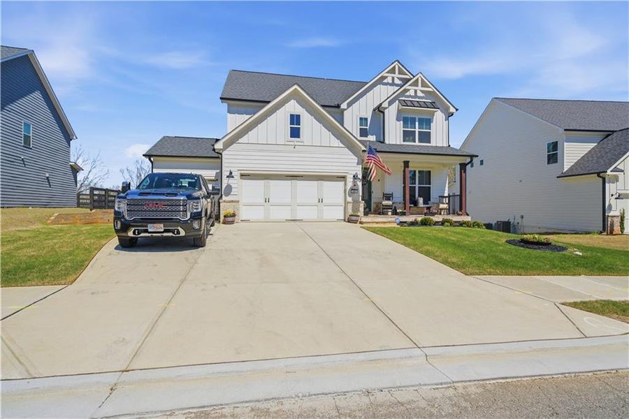 Front exterior of a new home in , Dallas, GA, highlighting curb appeal (Image 23).