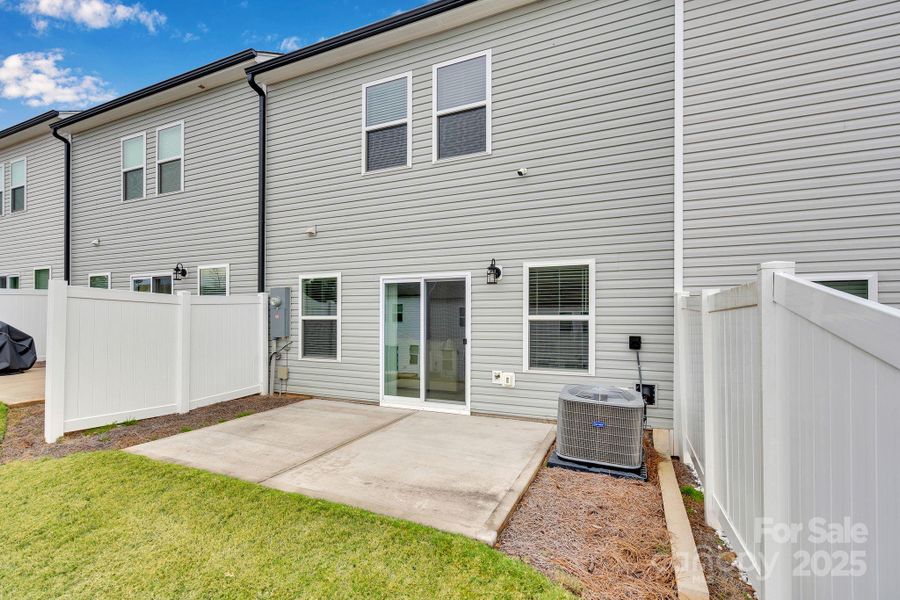 Exterior details and patio area of a home in , Charlotte (Image 4). Exterior details and patio area of a home in , Charlotte (Image 4).