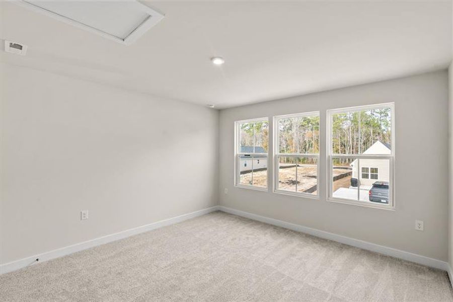 Spacious, unfurnished interior of a new home in Middle Creek Village Coastal Cottages & Villas, Bolivia (Image 16).