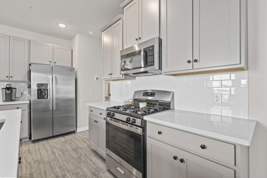 Furnished interior view inside a new home in K. Hovnanian's® Four Seasons at Lakes of Cane Bay, Summerville (Image 28). Furnished interior view inside a new home in K. Hovnanian's® Four Seasons at Lakes of Cane Bay, Summerville (Image 28).