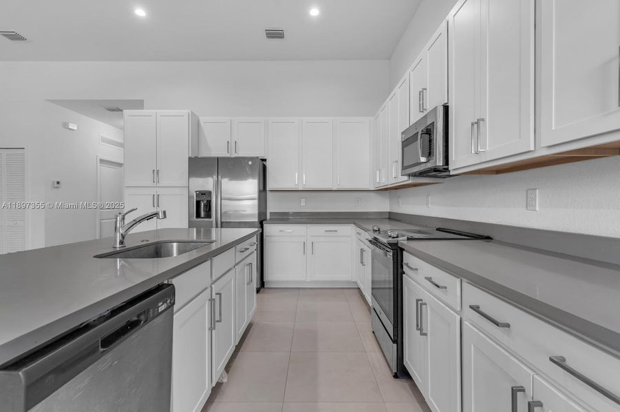 Furnished interior in a model home at Century Royal Homes in Homestead (Image 6).