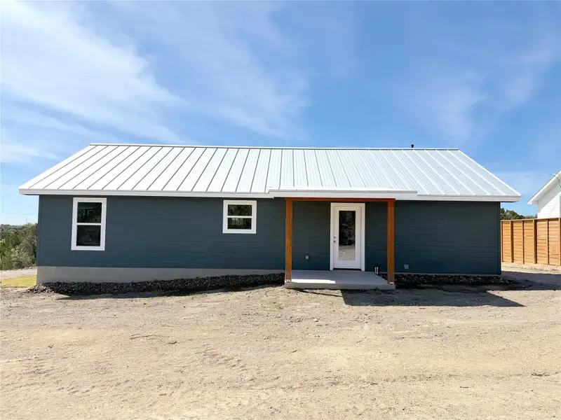 Exterior details and patio area of a home in , Spring Branch (Image 4).