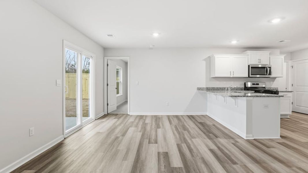 Spacious, unfurnished interior of a new home in Bentley Park, Greenwood (Image 18).