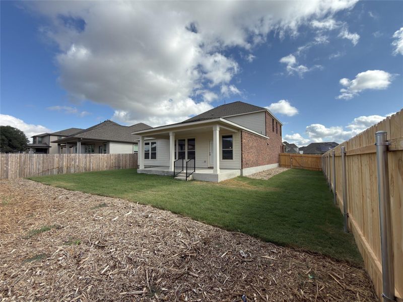 Exterior details and patio area of a home in River Bluff, Leander (Image 24).