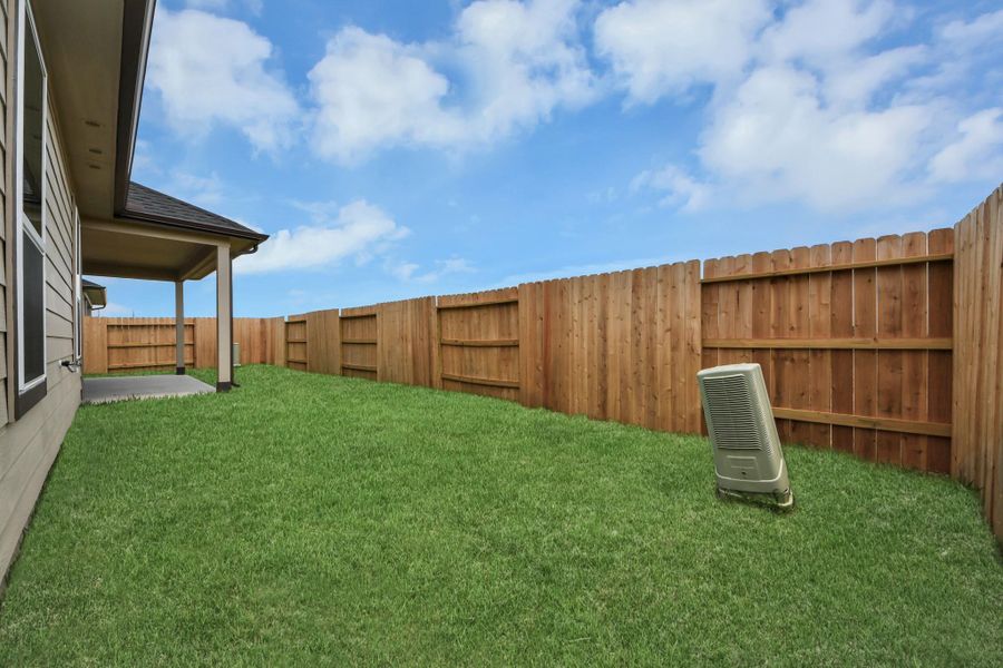Backyard retreat, offering an abundance of space for kids to play and explore. The possibilities are endless in this outdoor haven, where the joy of open-air activities and family gatherings awaits. Backyard retreat, offering an abundance of space for kids to play and explore. The possibilities are endless in this outdoor haven, where the joy of open-air activities and family gatherings awaits.