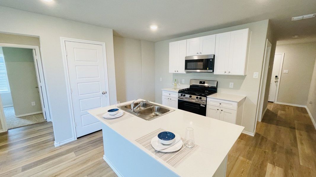 Furnished interior view inside a new home in Sunnycreek, Crowley (Image 6).