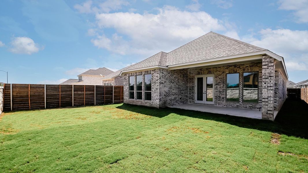 Exterior details and patio area of a home in Juniper Springs, Lockhart (Image 4).