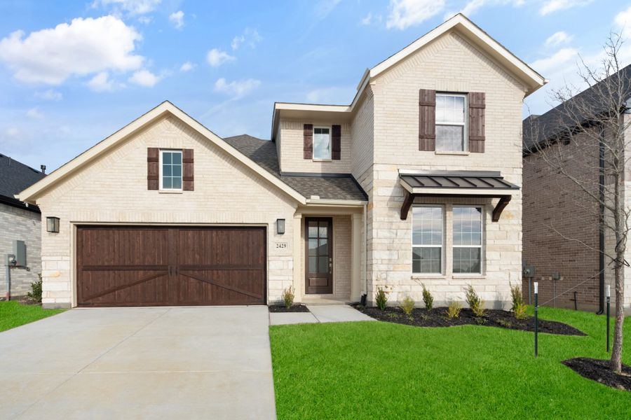Front exterior of a new home in Legacy Hills, Celina, TX, highlighting curb appeal (Image 22).