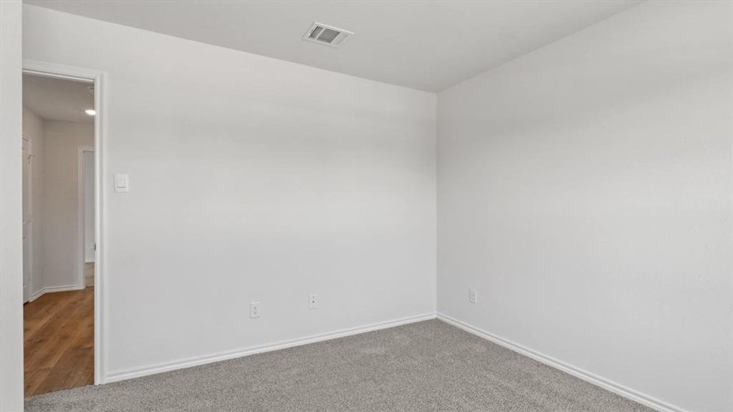 Unfurnished room featuring carpet flooring