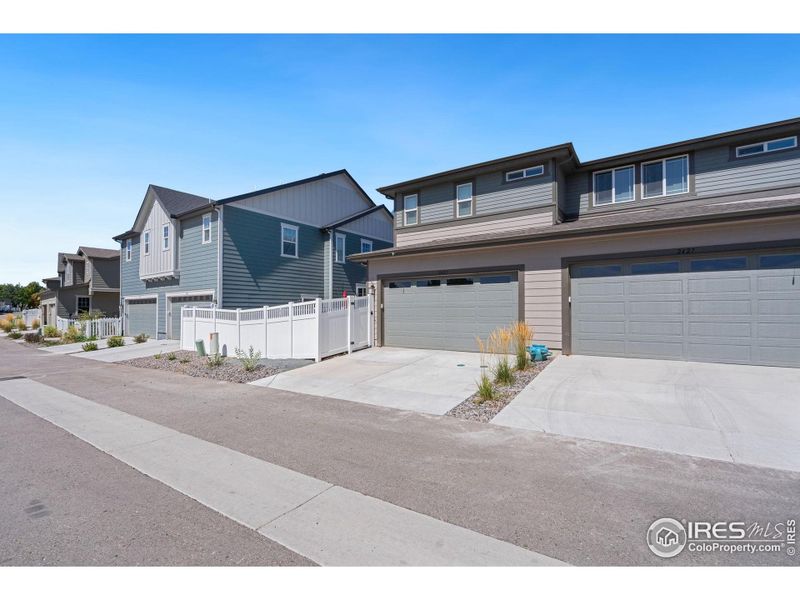 Back Alley Way Provides Access to Garage Space and Secure Entrance