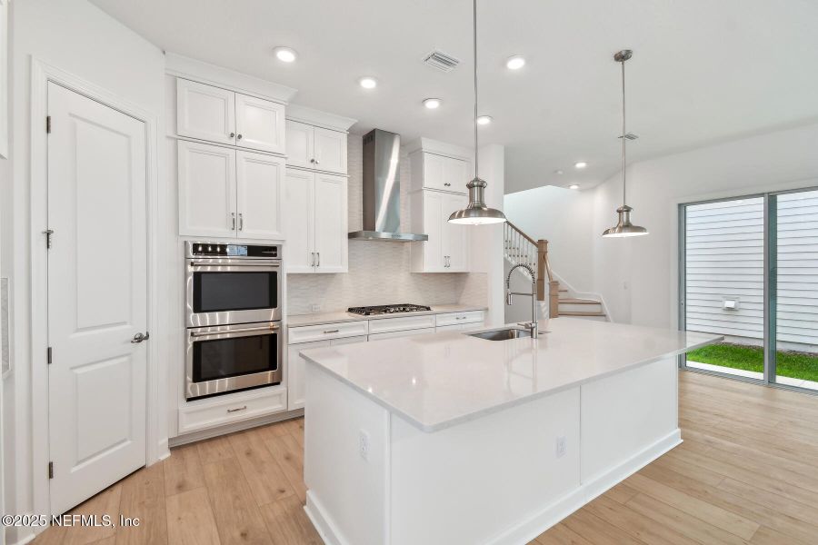 Furnished interior view inside a new home in Reflections 40' Front Load, Ponte Vedra (Image 9).