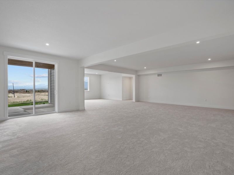 Representative unfurnished interior of a home built from the Walter by Lokal Homes in Paint Brush Hills, Peyton (Image 24).