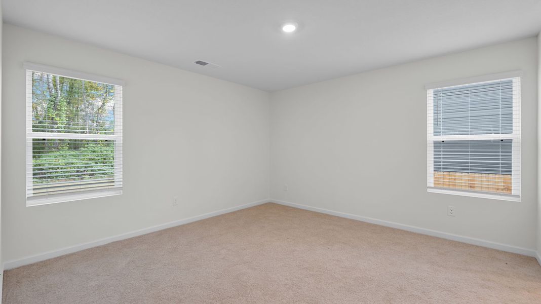 Representative unfurnished interior of a home built from the Lewis by D.R. Horton in Crescent Ridge, Niota (Image 15).