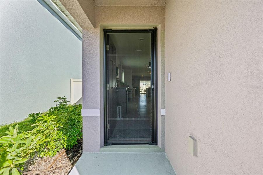 Exterior details and patio area of a home in Silverstone North, Palmetto (Image 23).