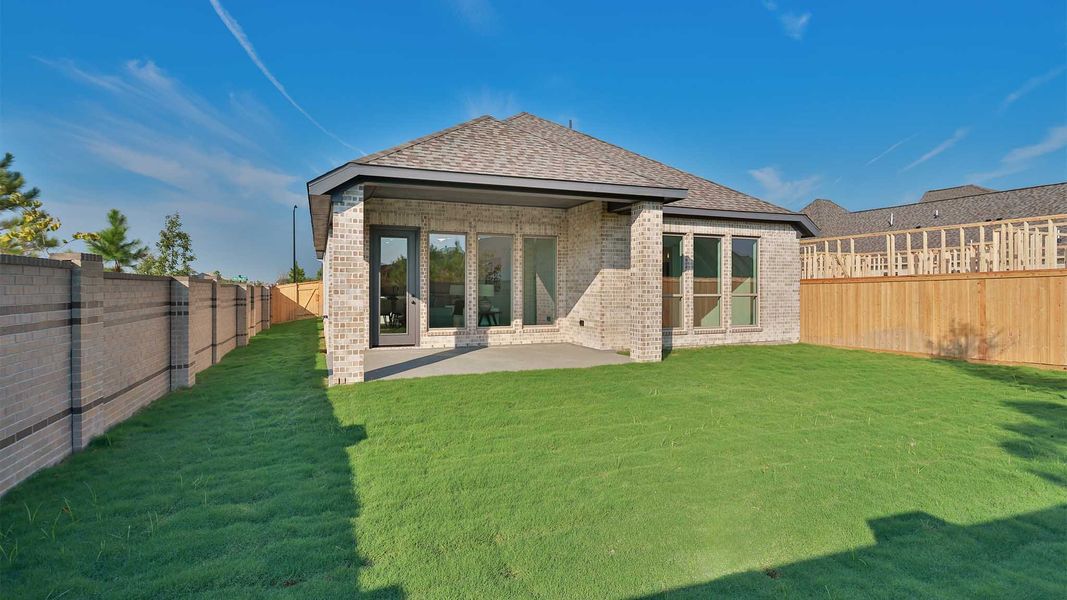 Exterior details and patio area of a home in Bridgeland, Cypress (Image 2). Exterior details and patio area of a home in Bridgeland, Cypress (Image 2).