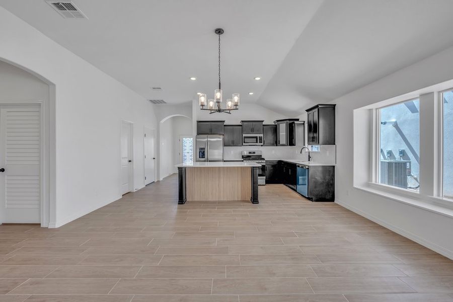 Representative furnished interior of a home built from the The Monica – 2012SSC by Saratoga Homes in Paseo Del Este, El Paso (Image 9).