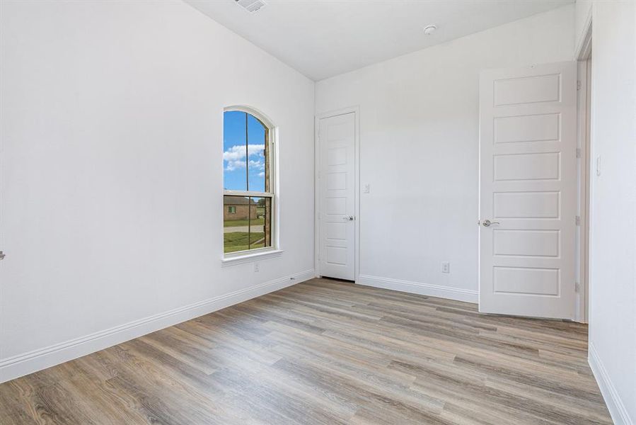 Spacious, unfurnished interior of a new home in Stone Henge II, Sanger (Image 26).