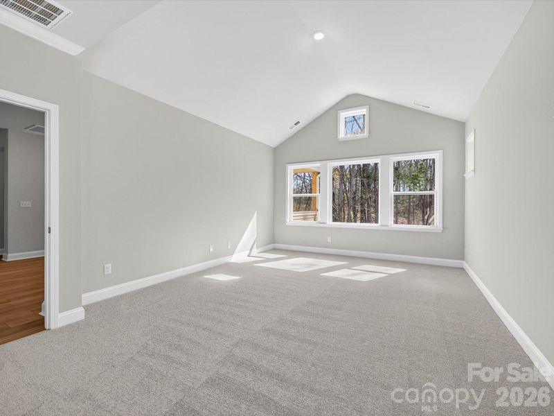 Spacious, unfurnished interior of a new home in North Creek Village, Huntersville (Image 35).