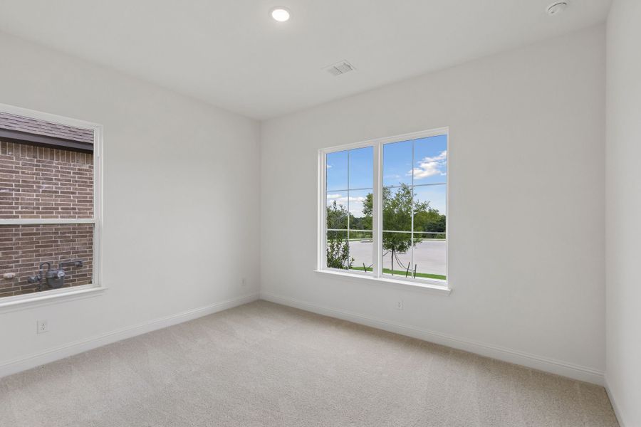 Representative unfurnished interior of a home built from the Pecos by Sandlin Homes in Settler's Glen, New Fairview (Image 26).