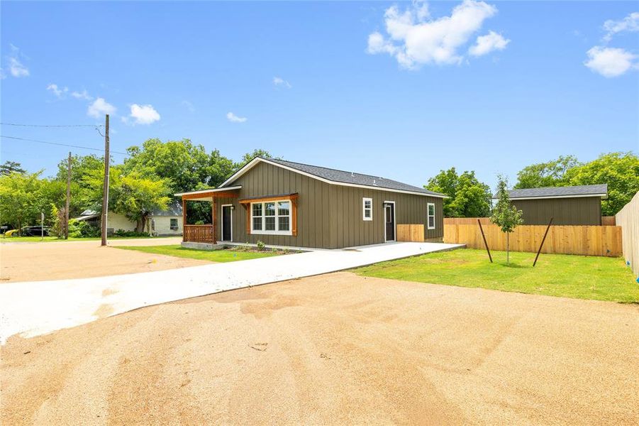 View of front of home featuring board and batten siding View of front of home featuring board and batten siding