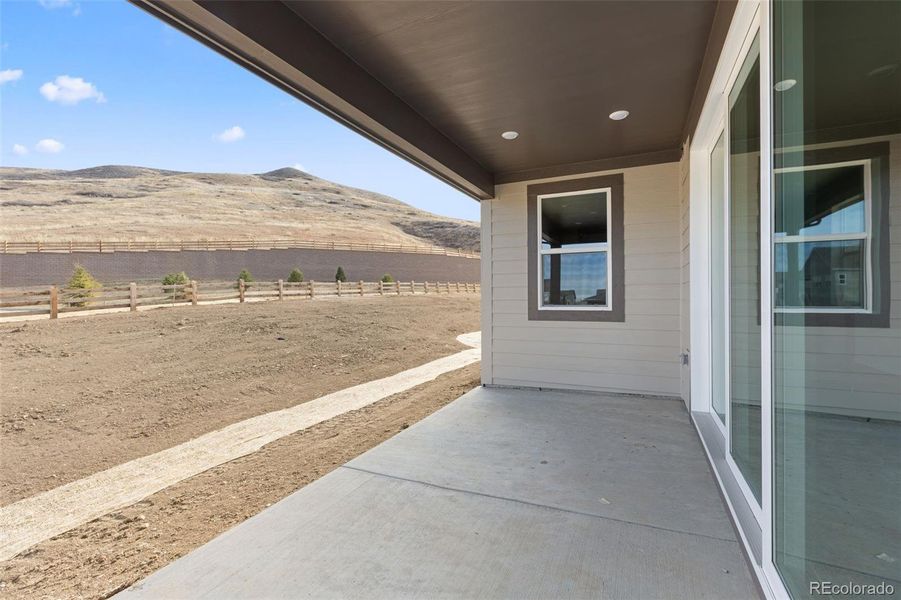 Exterior details and patio area of a home in The Manors Collection at Golden Overlook, Golden (Image 4).