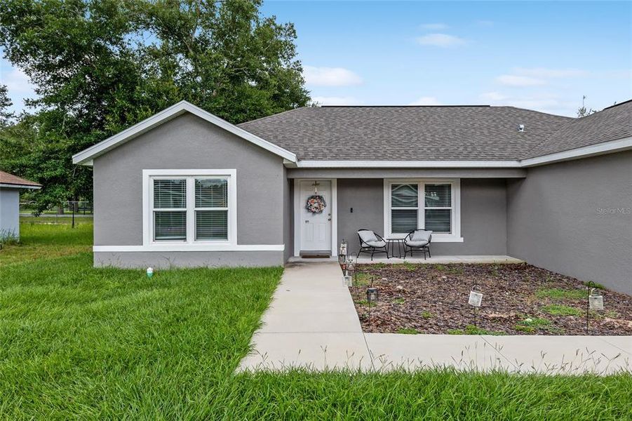 Front exterior of a new home in , Ocala, FL, highlighting curb appeal (Image 25). Front exterior of a new home in , Ocala, FL, highlighting curb appeal (Image 25).