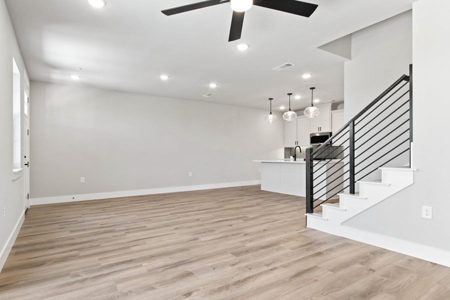Spacious, unfurnished interior of a new home in The Tribute, The Colony (Image 23).