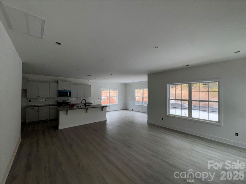 open floor plan for living room, kitchen and dining