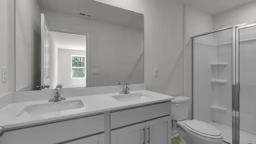 Furnished interior view inside a new home in The Townes at Prestleigh, Wake Forest (Image 9).