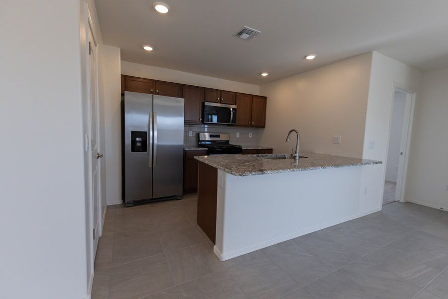 Furnished interior view inside a new home in Saguaro Haven, Tucson (Image 4).
