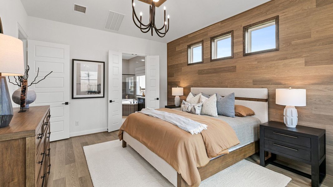 Representative furnished interior of a home built from the Magnolia by Brightland Homes in Sunterra, Katy (Image 12).