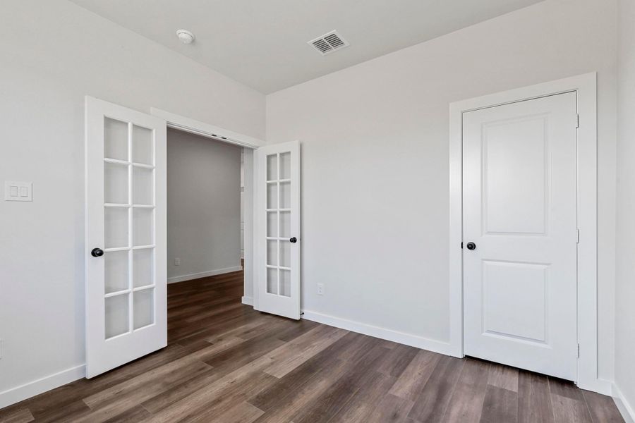 Representative unfurnished interior of a home built from the Garrison II by Cheldan Homes in Arbor Oaks, Boyd (Image 29).