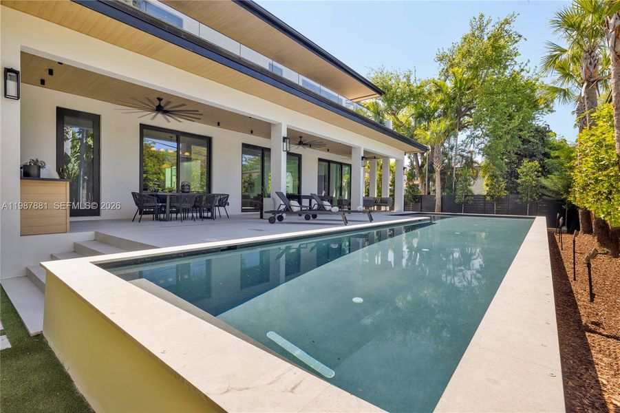 Exterior details and patio area of a home in , Miami (Image 3).
