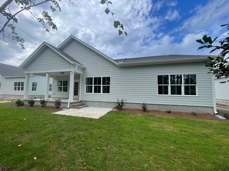 Representative exterior photo of a completed home built from the Lanai by Bill Clark Homes in The Sanctuary at Sunset Beach, Sunset Beach, NC (Image 31). Representative exterior photo of a completed home built from the Lanai by Bill Clark Homes in The Sanctuary at Sunset Beach, Sunset Beach, NC (Image 31).