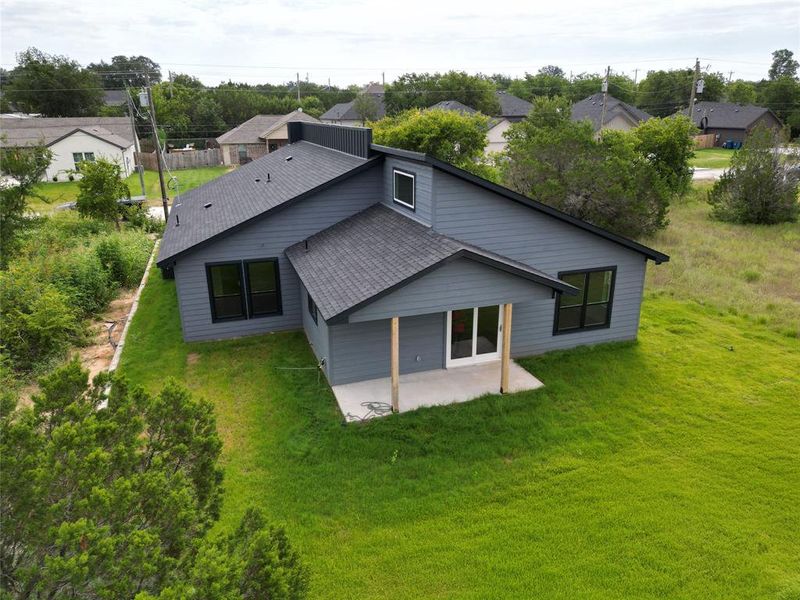 Front exterior of a new home in , Granbury, TX, highlighting curb appeal (Image 14). Front exterior of a new home in , Granbury, TX, highlighting curb appeal (Image 14).