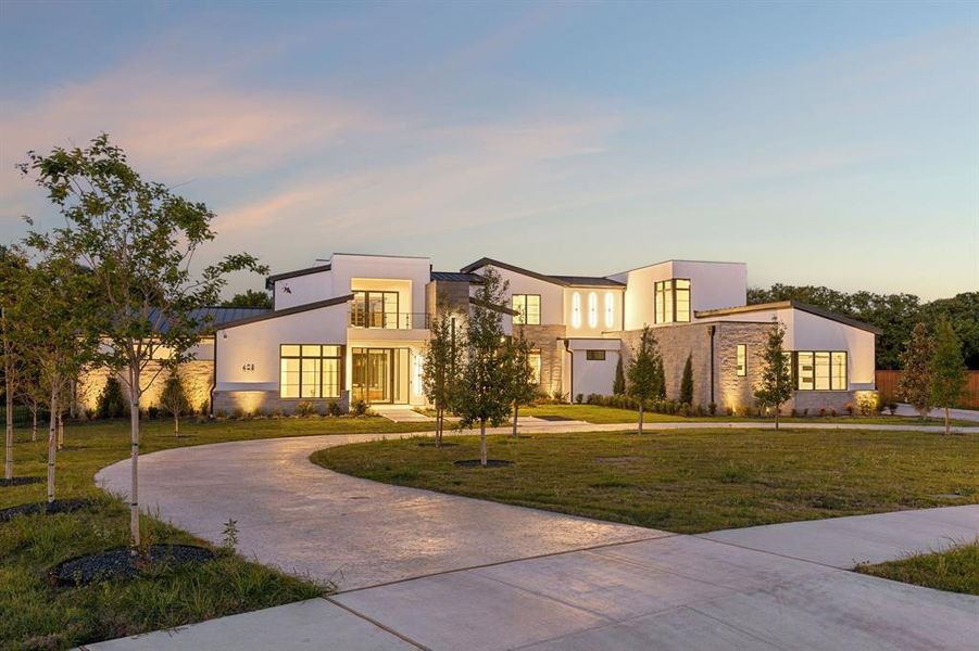 Front exterior of a new home in , Southlake, TX, highlighting curb appeal (Image 2). Front exterior of a new home in , Southlake, TX, highlighting curb appeal (Image 2).