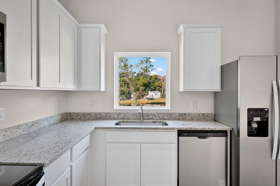 Furnished interior view inside a new home in , Deltona (Image 9).
