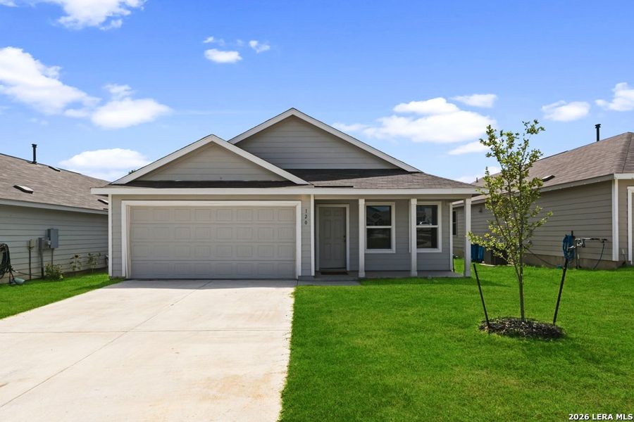 Front exterior of a new home in Lodi Grove, Floresville, TX, highlighting curb appeal (Image 15). Front exterior of a new home in Lodi Grove, Floresville, TX, highlighting curb appeal (Image 15).