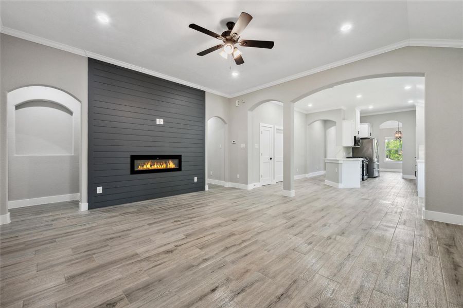 Living room is open to breakfast room and kitchen. Great flow for ease of entertaining.